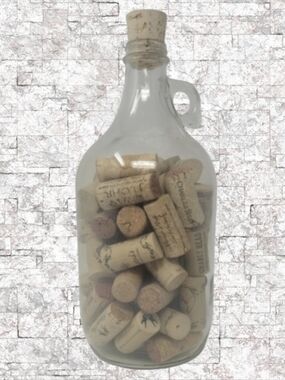 GLASS JAR OF WINE CORKS